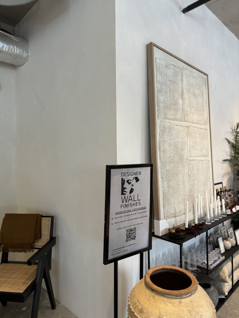 Light stone look Venetian plaster wall in an Ottawa commercial showroom