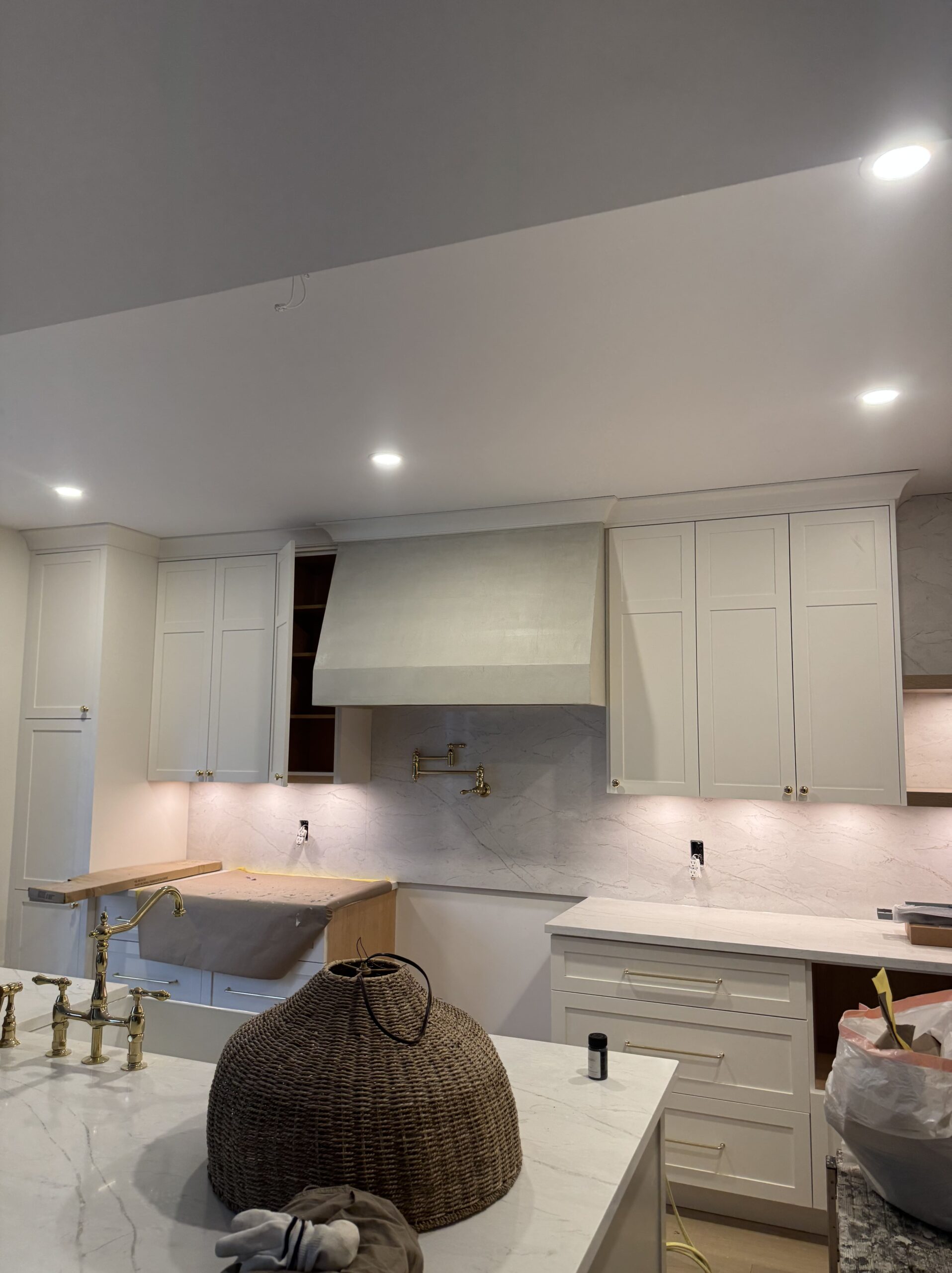 Venetian plaster range hood in an Ottawa kitchen