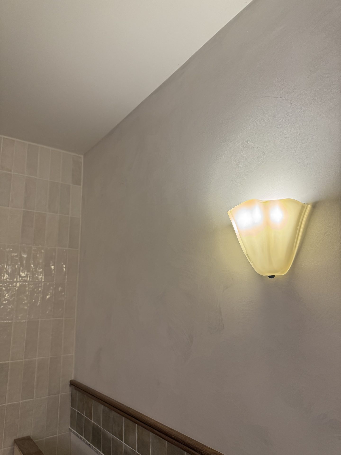 Limewash bathroom wall with tile wainscot, Ottawa