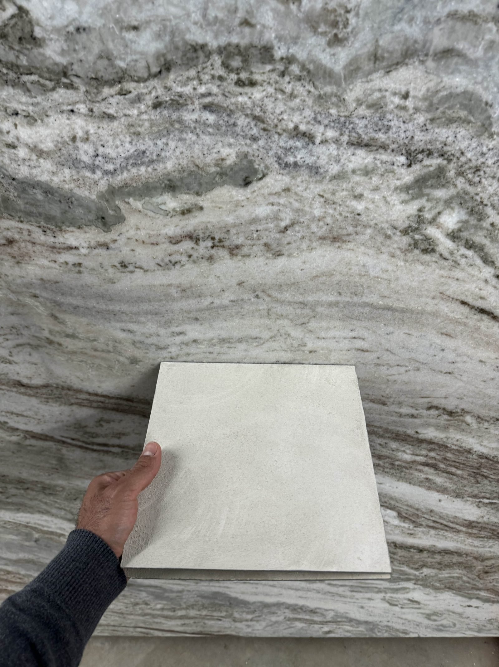 Venetian plaster finish with lime wash applied, showing layered troweled texture and matte chalky surface detail