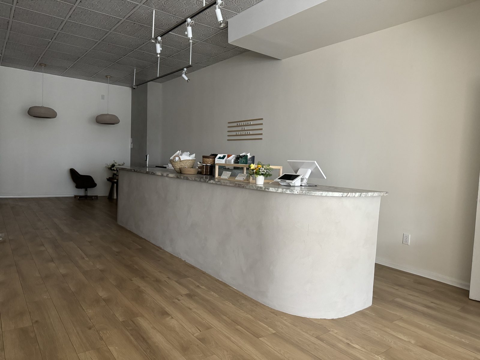 Limewash finish on exterior brick wall showing textured, breathable coating with natural color variation and chalky appearance